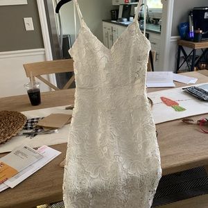 White lace knee length dress